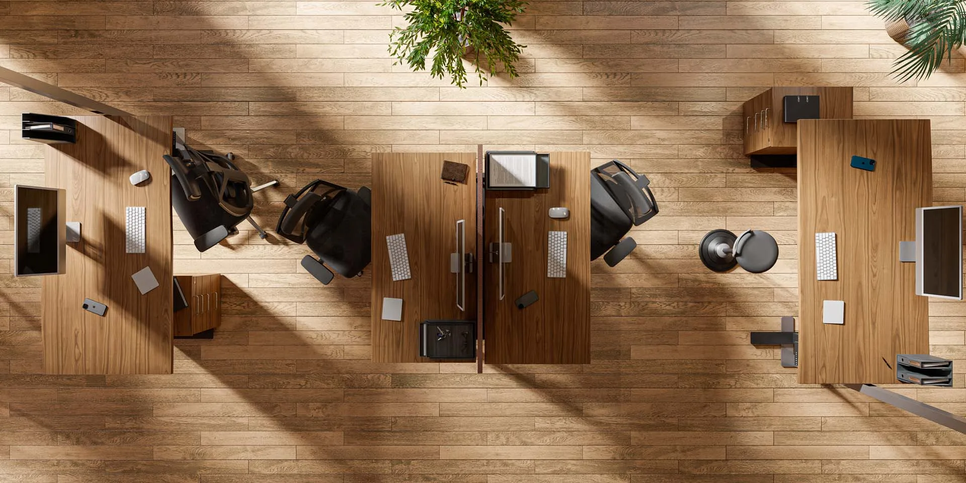 3 ergonomische Arbeitsplätze in einem Großraumbüro aus der Vogelperspektive