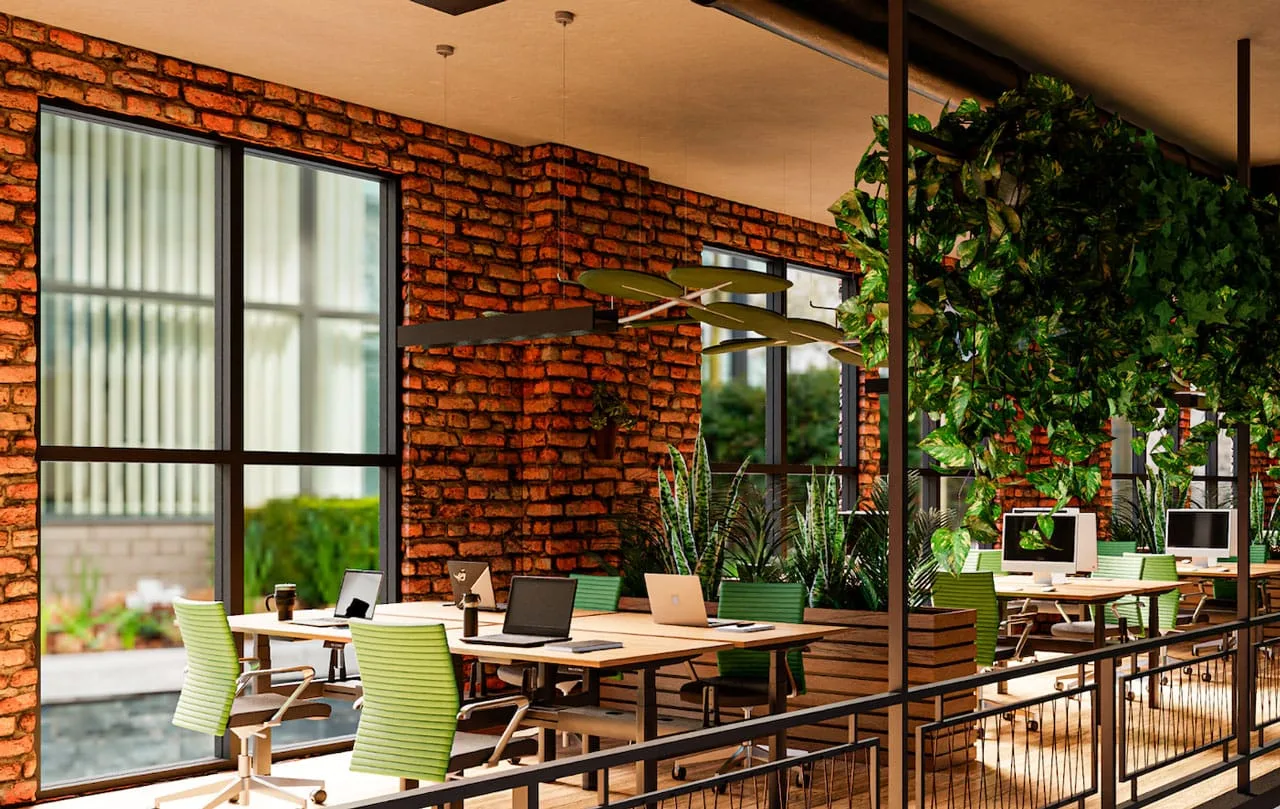 Modernes Büro mit ergonomischen Arbeitsplätzen, begrüntem Raumkonzept und großen Fenstern für natürliche Beleuchtung